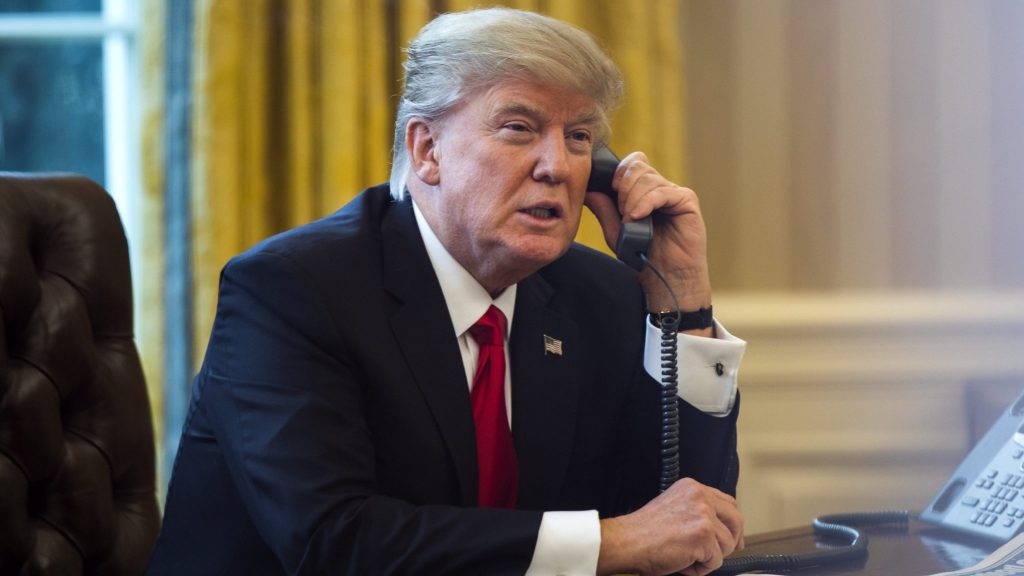 Donald Trump wearing a suit and tie