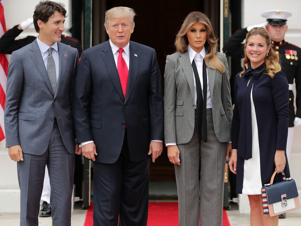 Donald Trump, Melania Trump, Sophie Gregoire posing for the camera