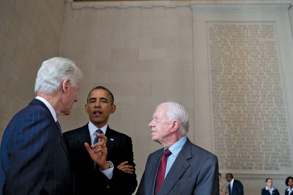 Barack Obama wearing a suit and tie