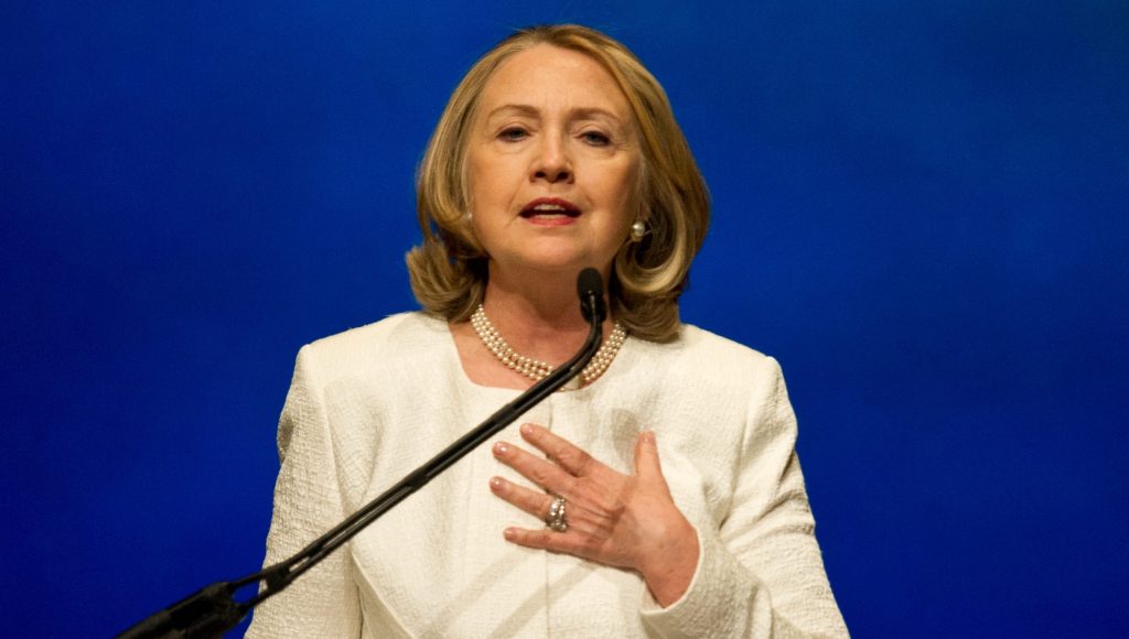 Hillary Clinton holding a microphone