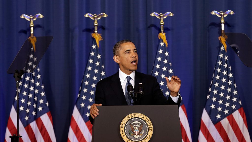 Barack Obama wearing a suit and tie