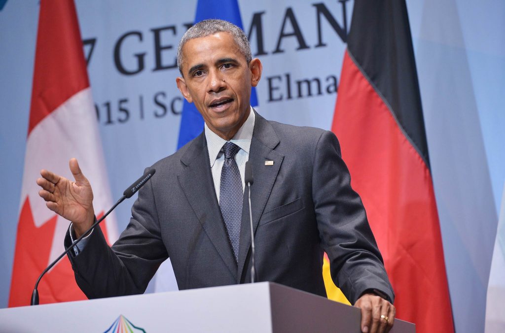 Barack Obama wearing a suit and tie